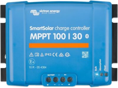 Victron Energy SmartSolar MPPT 100/30 blue charge controller mounted on a wooden board for a camper solar setup.
