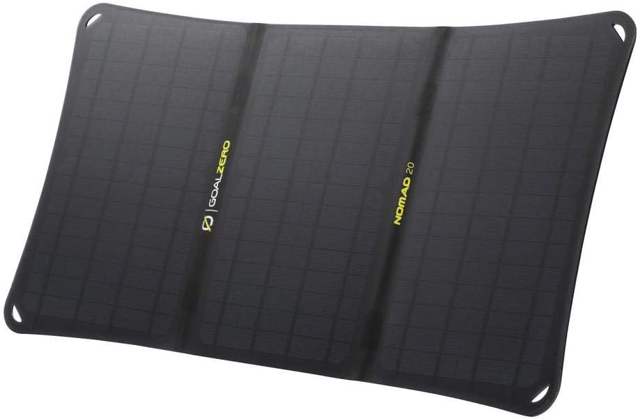 Goal Zero Nomad 20 foldable monocrystalline solar panel unfolded on a rocky terrain with the kickstand out facing the sun.