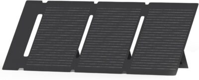 AFERIY 30W ETFE solar panel charger unfolded on a rock in direct sunlight, charging a smartphone via its USB port at a campsite.