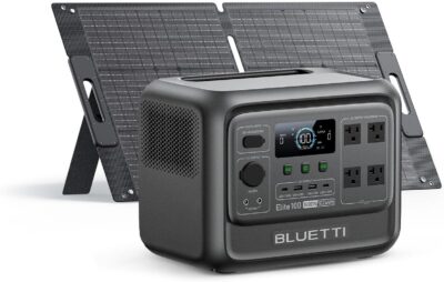BLUETTI Elite 100 V2 portable power station with its foldable 100W solar panel on a sunny forest campsite