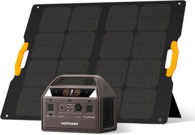 The UDPOWER C600 portable solar generator and its 120W foldable solar panel charging in the sun at an American campsite