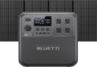 BLUETTI Elite 200 V2 portable power station with its 350W solar panel setup on a grassy campsite next to a camper van