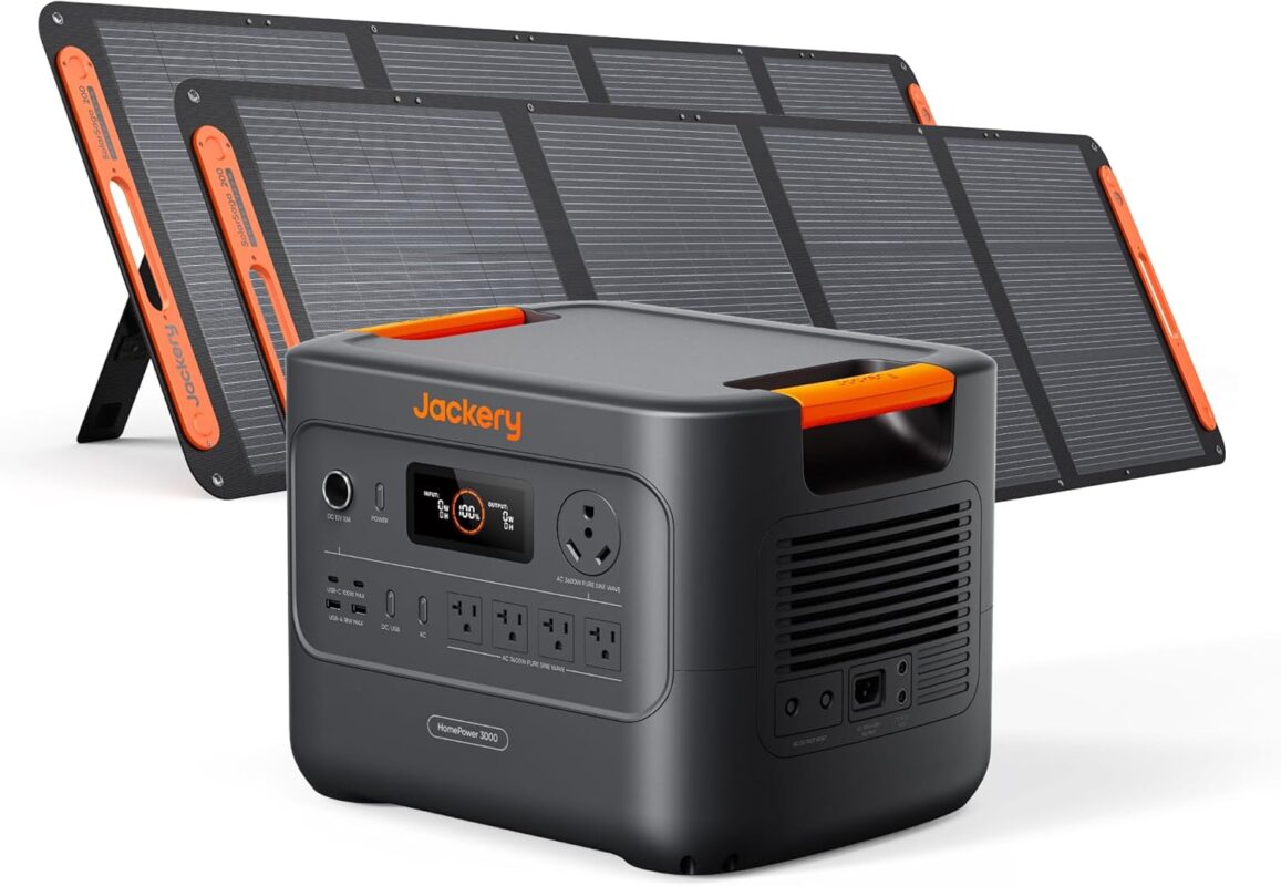 Jackery HomePower 3000 solar generator with two 200W solar panels set up in a backyard for home emergency backup.
