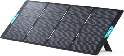 Anker SOLIX PS400 400W foldable solar panel standing on adjustable kickstands in a sunny field with smart alignment tool visible