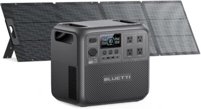 BLUETTI Elite 200 V2 Solar Generator with unfolded 200W solar panel in a sunny outdoor campsite setting