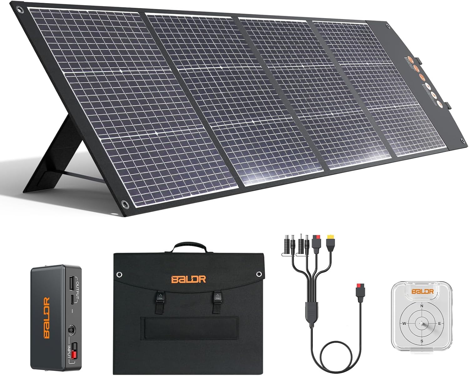 BALDR 200W portable solar panel unfolded on green grass with adjustable kickstands under bright sunlight.