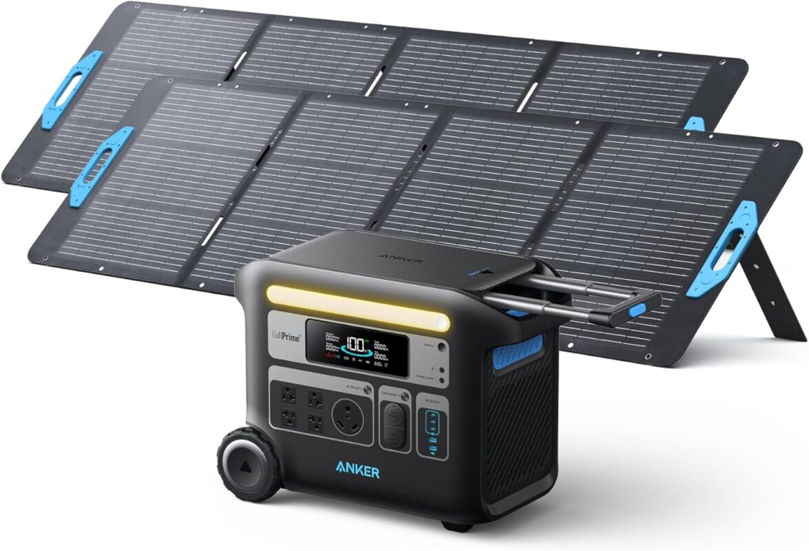 Anker SOLIX F2000 Solar Generator on wheels with two 200W foldable solar panels set up in a sunny camping environment