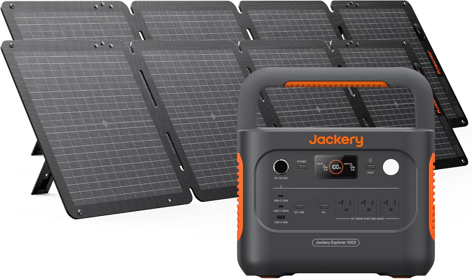 Jackery Solar Generator 1000 v2 power station connected to two SolarSaga 100W panels in a sunny meadow.